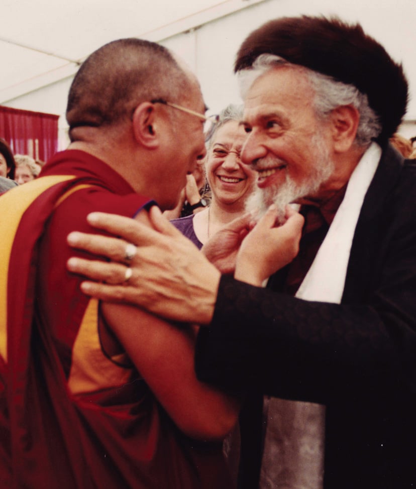 The Dalai Lama tugs on Rabbi Zalman Schachter-Shalomi's beard at Naropa in 1997