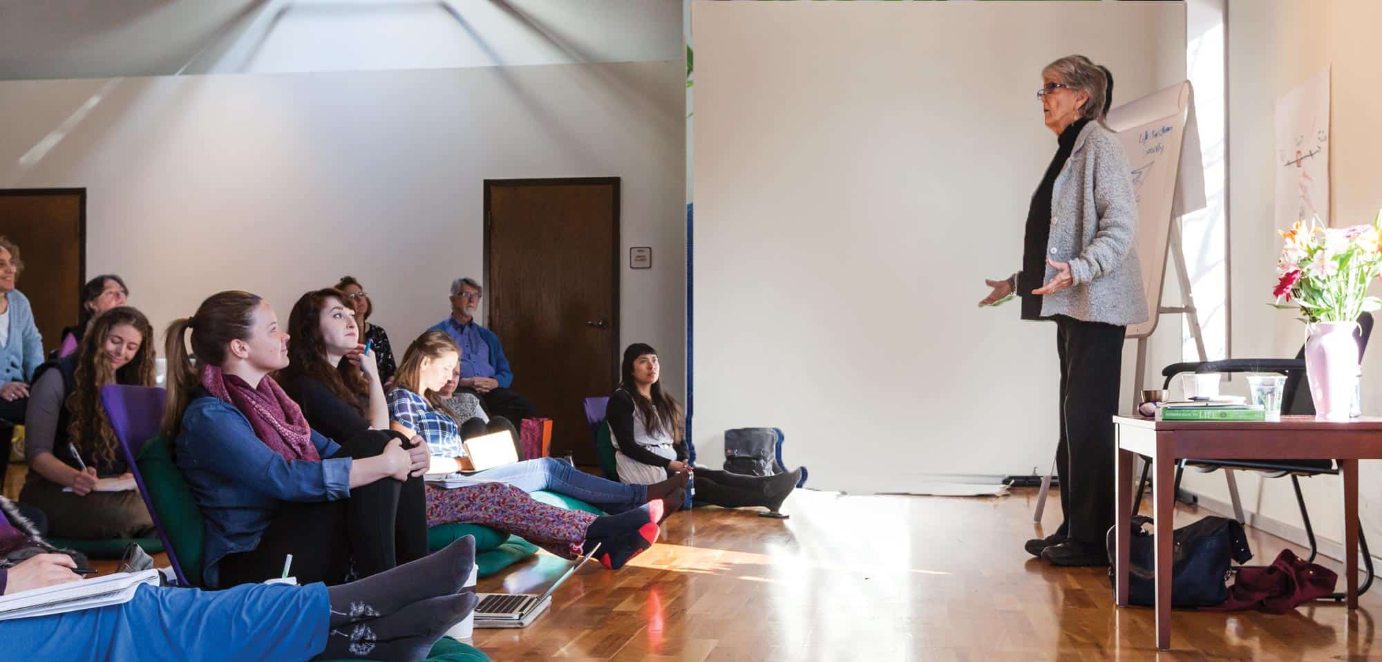 Joanna Macy teaching a group of MA in Environmental Leadership students